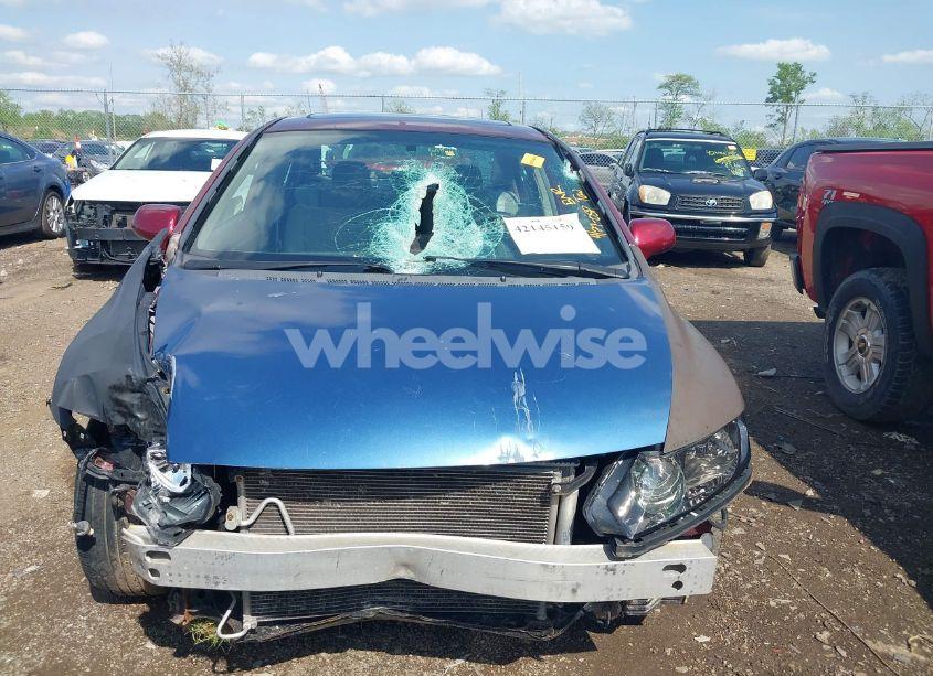 Photo 12 of 2011 Honda Civic EX (VIN 19XFA1F81BE021525)