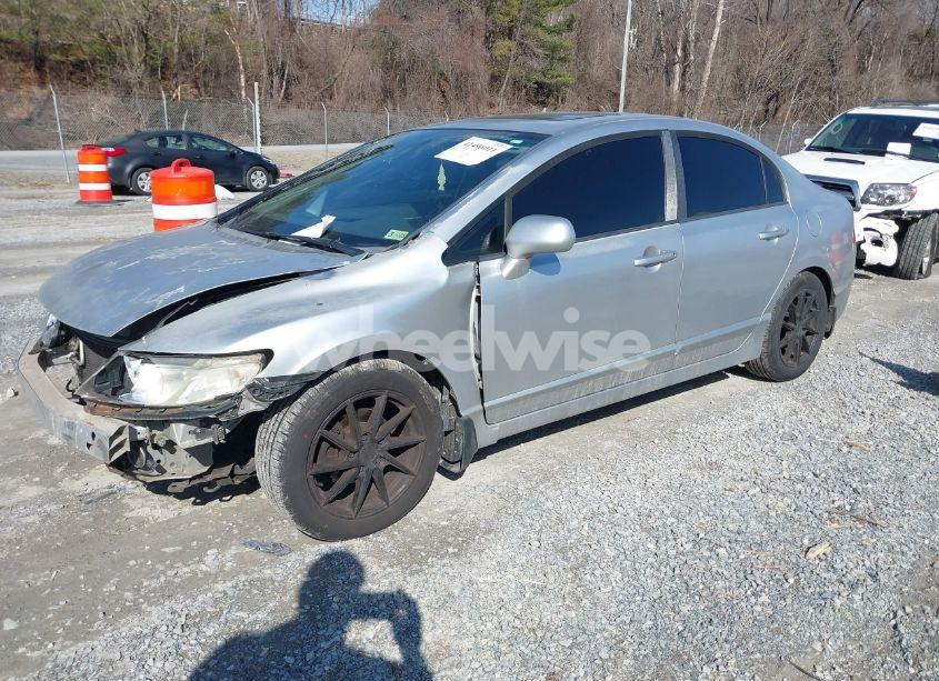 Photo 2 of 2010 Honda Civic EX (VIN 19XFA1F8XAE033624)