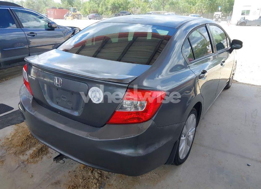 Photo 4 of 2012 Honda Civic LX (VIN 19XFB2E57CE059580)