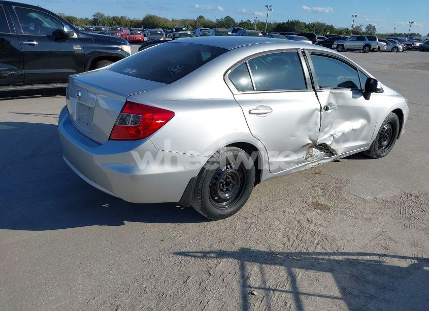 Photo 4 of 2012 Honda Civic SDN LX (VIN 19XFB2F50CE085758)