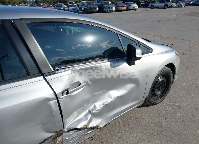 Photo 6 of 2012 Honda Civic SDN LX (VIN 19XFB2F50CE085758)