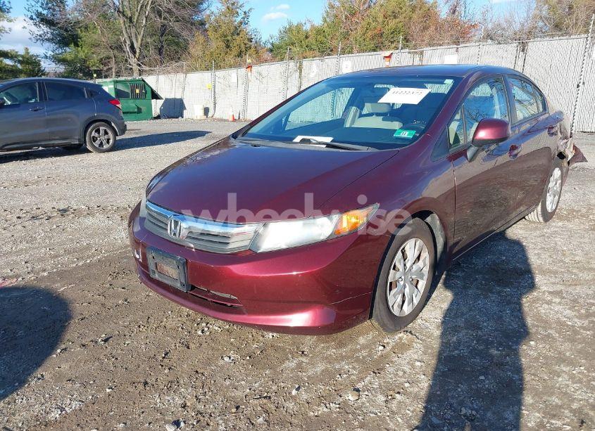 Photo 2 of 2012 Honda Civic SDN LX (VIN 19XFB2F51CE385406)