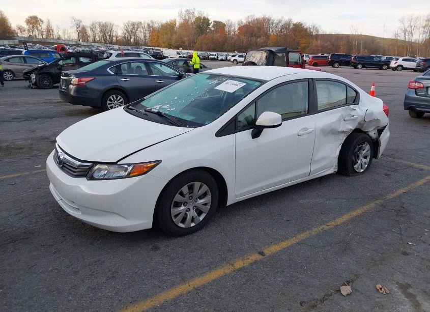 Photo 2 of 2012 Honda Civic SDN LX (VIN 19XFB2F52CE091402)