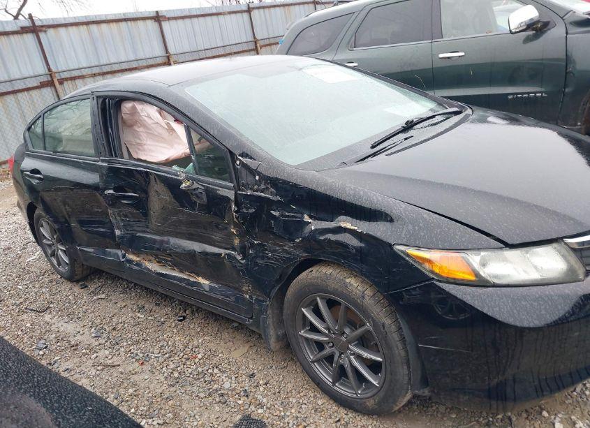 Photo 6 of 2012 Honda Civic SDN LX (VIN 19XFB2F52CE097832)