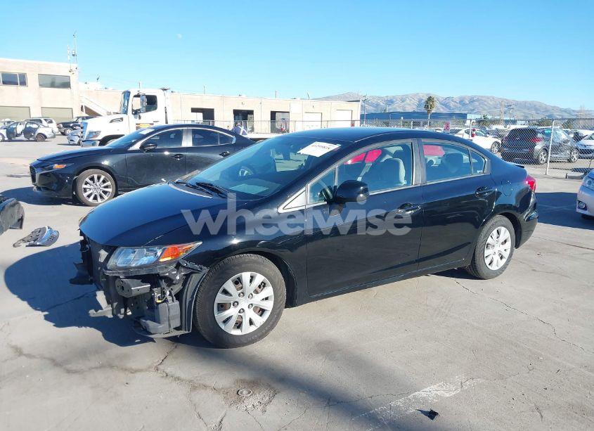 Photo 2 of 2012 Honda Civic SDN LX (VIN 19XFB2F52CE360837)