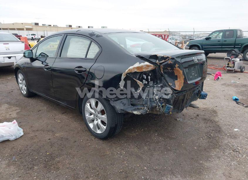 Photo 3 of 2012 Honda Civic SDN LX (VIN 19XFB2F52CE379176)