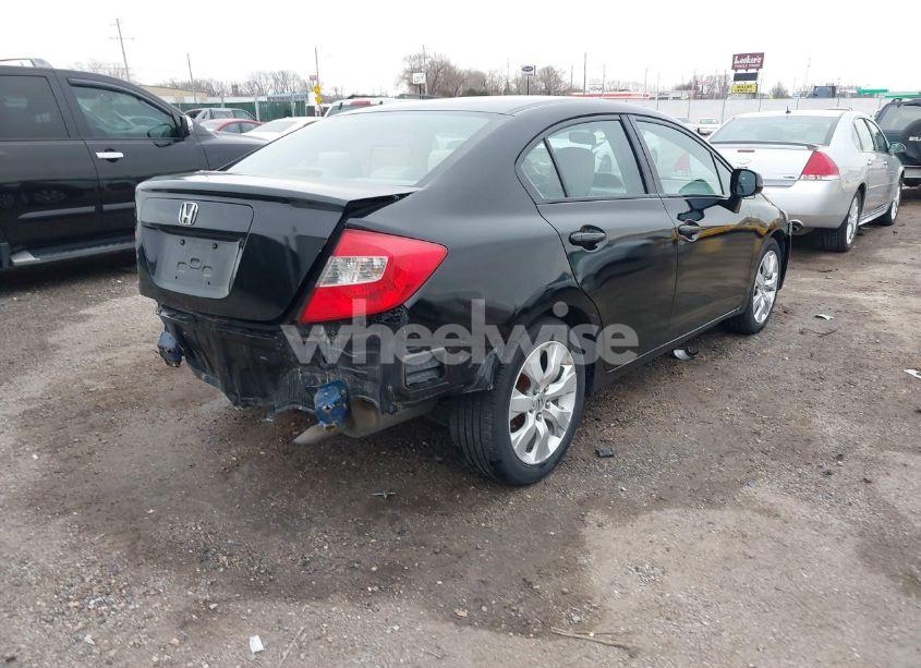 Photo 4 of 2012 Honda Civic SDN LX (VIN 19XFB2F52CE379176)