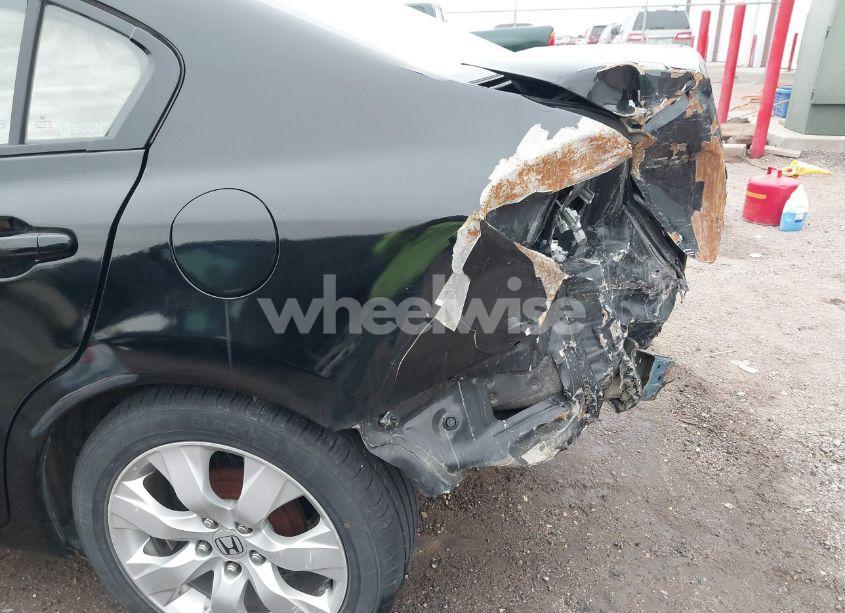 Photo 6 of 2012 Honda Civic SDN LX (VIN 19XFB2F52CE379176)