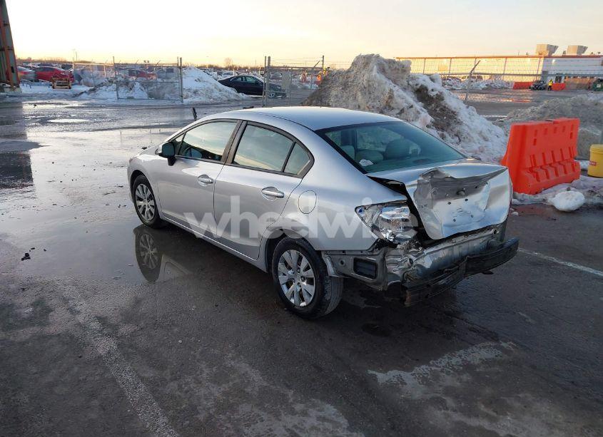 Photo 3 of 2012 Honda Civic SDN LX (VIN 19XFB2F52CE392493)
