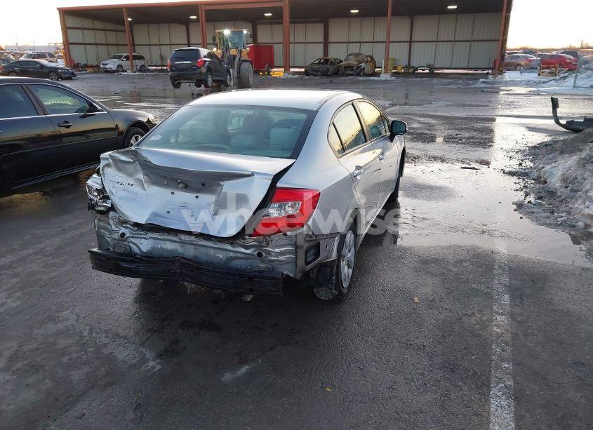 Photo 4 of 2012 Honda Civic SDN LX (VIN 19XFB2F52CE392493)