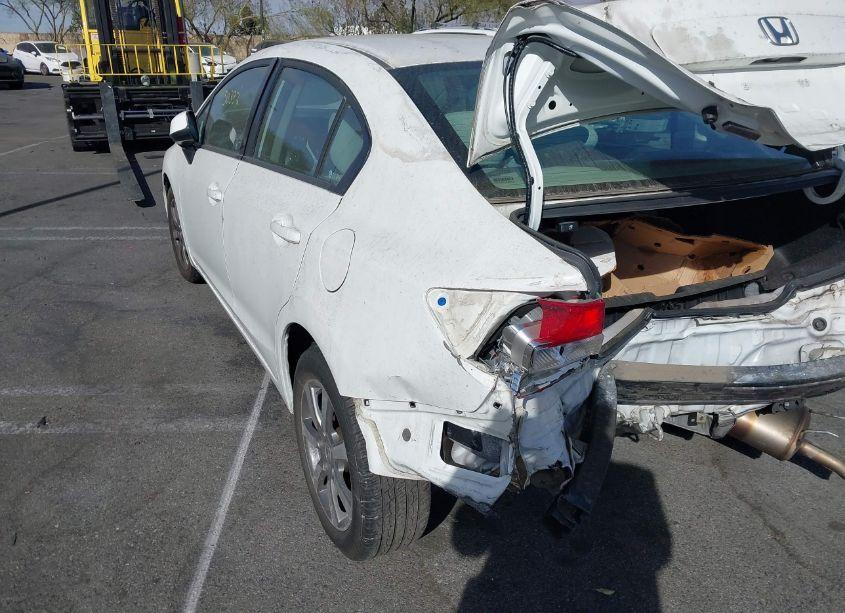 Photo 3 of 2012 Honda Civic SDN LX (VIN 19XFB2F53CE301165)