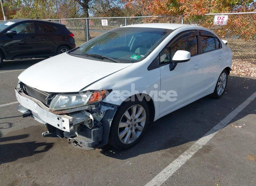 Photo 2 of 2012 Honda Civic LX (VIN 19XFB2F53CE334621)