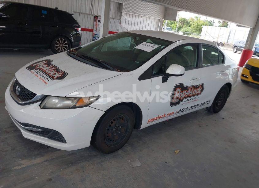 Photo 2 of 2013 Honda Civic LX (VIN 19XFB2F53DE069765)