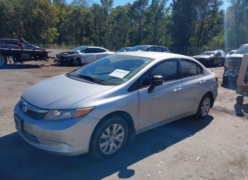 Photo 2 of 2012 Honda Civic SDN LX (VIN 19XFB2F54CE093894)