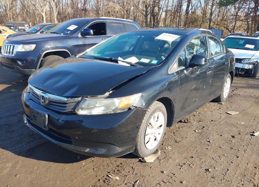 Photo 2 of 2012 Honda Civic SDN LX (VIN 19XFB2F54CE330934)