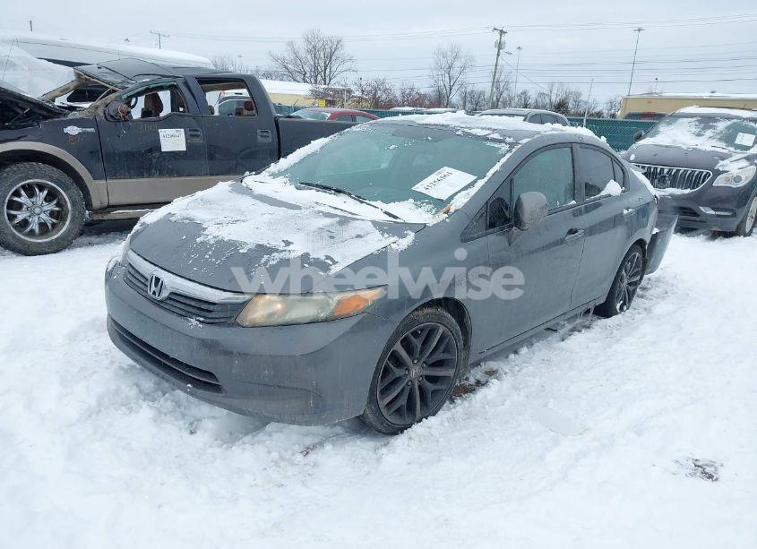 Photo 2 of 2012 Honda Civic SDN LX (VIN 19XFB2F55CE041027)