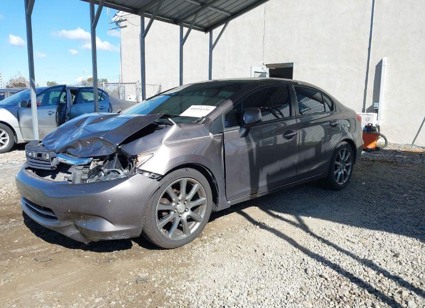 Photo 2 of 2012 Honda Civic SDN LX (VIN 19XFB2F55CE043506)