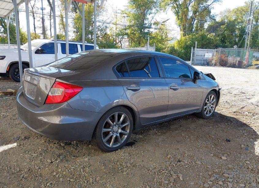 Photo 4 of 2012 Honda Civic SDN LX (VIN 19XFB2F55CE043506)