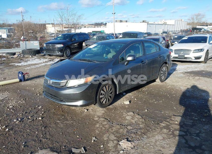 Photo 2 of 2012 Honda Civic SDN LX (VIN 19XFB2F55CE351694)