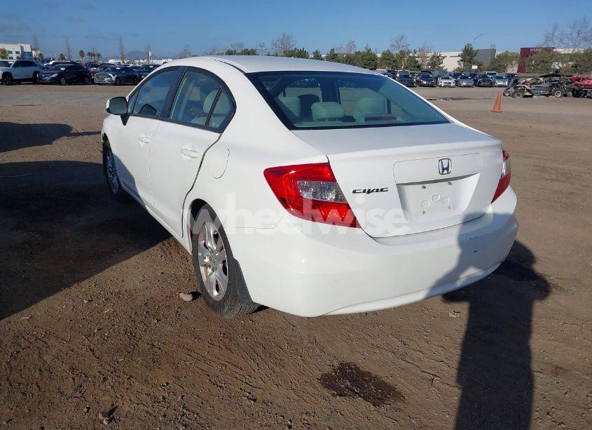 Photo 3 of 2012 Honda Civic SDN LX (VIN 19XFB2F55CE370598)