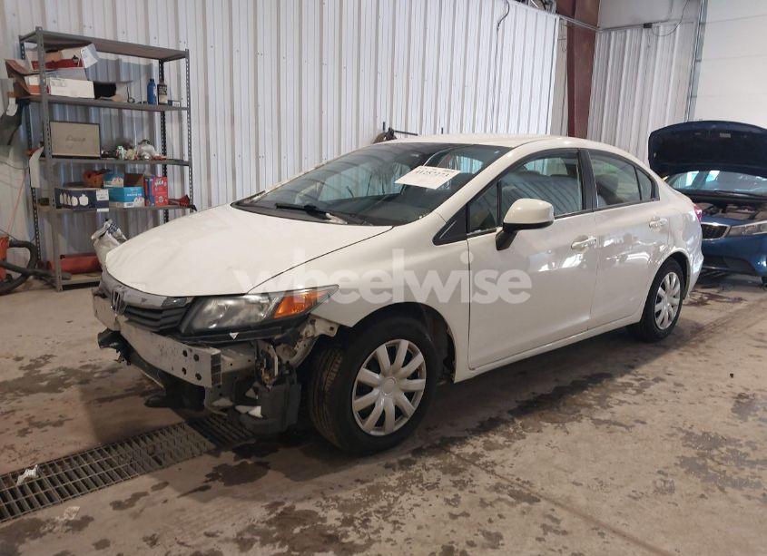 Photo 6 of 2012 Honda Civic SDN LX (VIN 19XFB2F56CE349338)