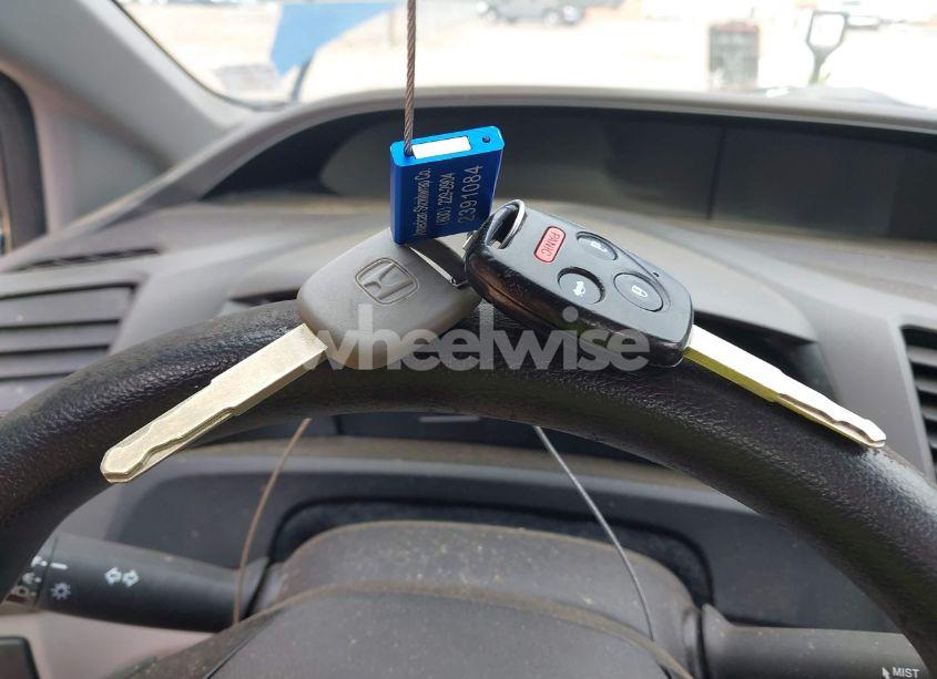 Photo 11 of 2012 Honda Civic LX (VIN 19XFB2F57CE005209)