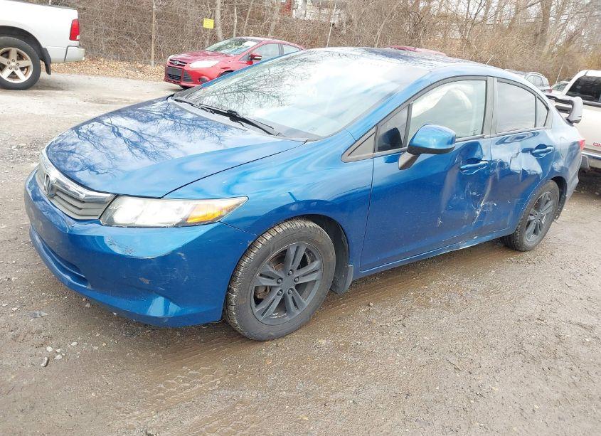 Photo 2 of 2012 Honda Civic SDN LX (VIN 19XFB2F58CE059828)