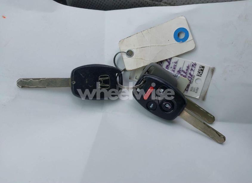 Photo 11 of 2012 Honda Civic LX (VIN 19XFB2F58CE338776)