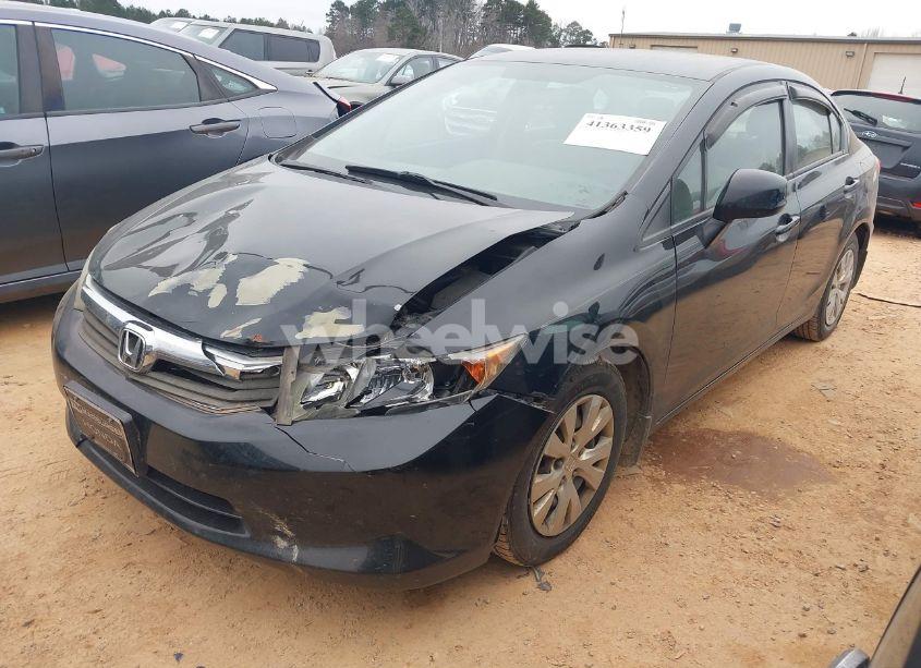 Photo 2 of 2012 Honda Civic SDN LX (VIN 19XFB2F59CE051608)