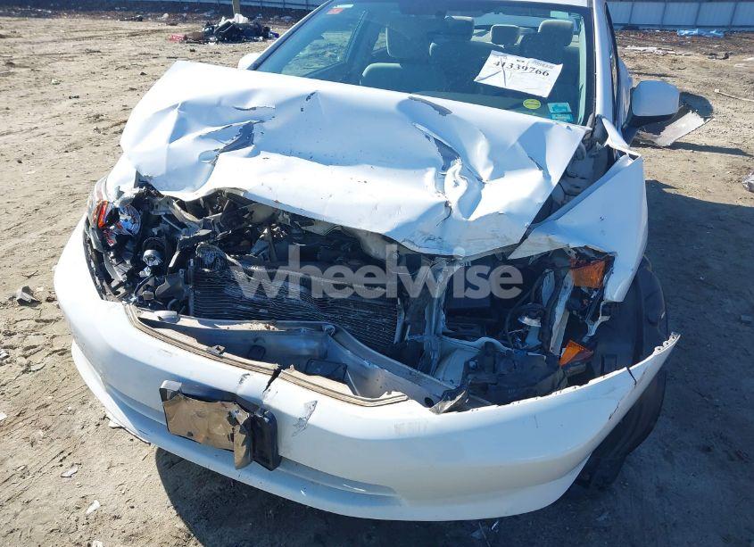 Photo 6 of 2012 Honda Civic SDN LX (VIN 19XFB2F59CE061670)