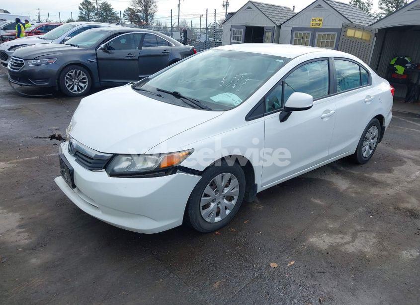 Photo 2 of 2012 Honda Civic SDN LX (VIN 19XFB2F59CE070076)