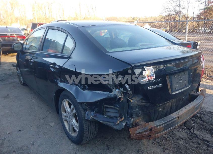 Photo 3 of 2012 Honda Civic SDN LX (VIN 19XFB2F59CE345977)