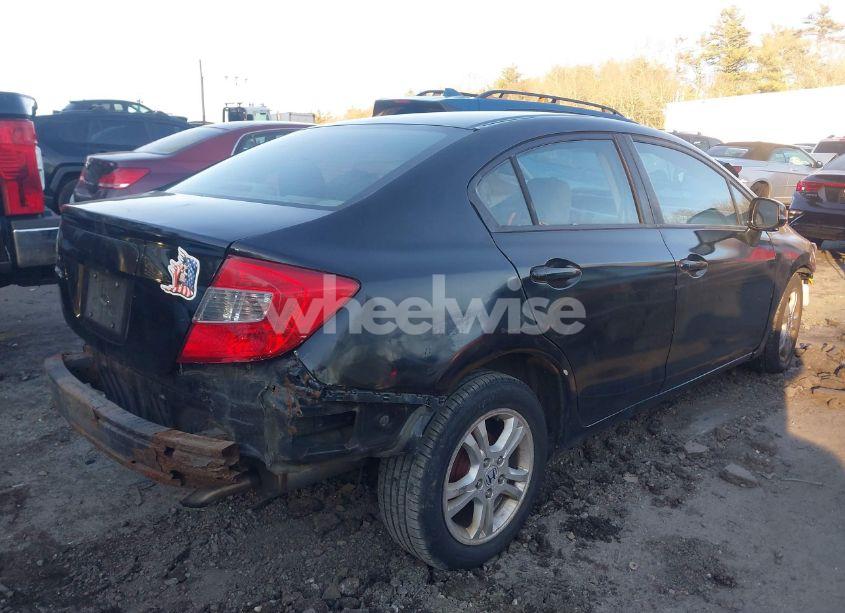 Photo 4 of 2012 Honda Civic SDN LX (VIN 19XFB2F59CE345977)