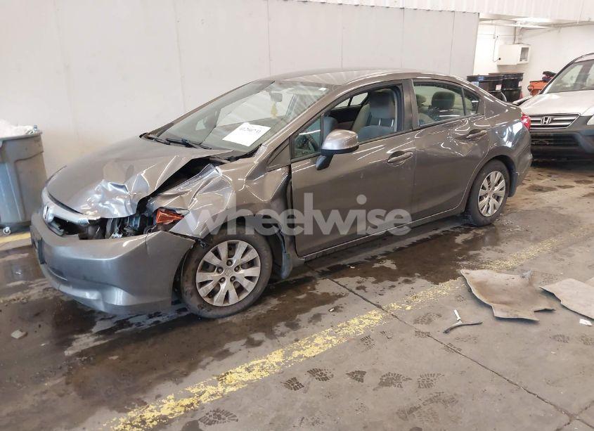 Photo 2 of 2012 Honda Civic SDN LX (VIN 19XFB2F59CE371706)