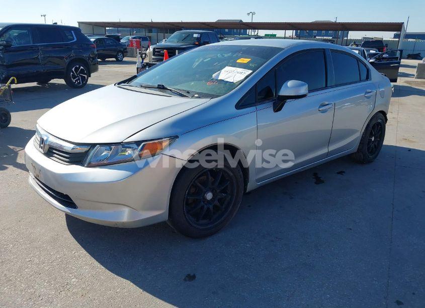 Photo 2 of 2012 Honda Civic SDN LX (VIN 19XFB2F5XCE008184)