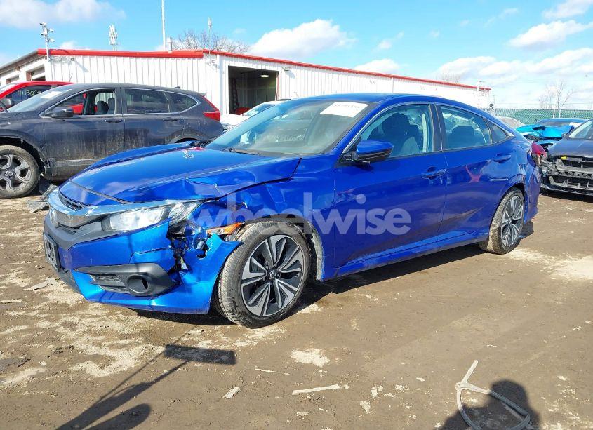Photo 2 of 2017 Honda Civic EX-T (VIN 19XFC1E33HE028257)