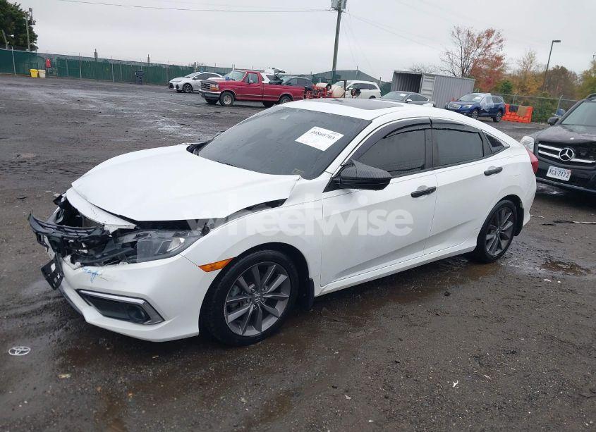 Photo 2 of 2019 Honda Civic EX (VIN 19XFC1F30KE014404)
