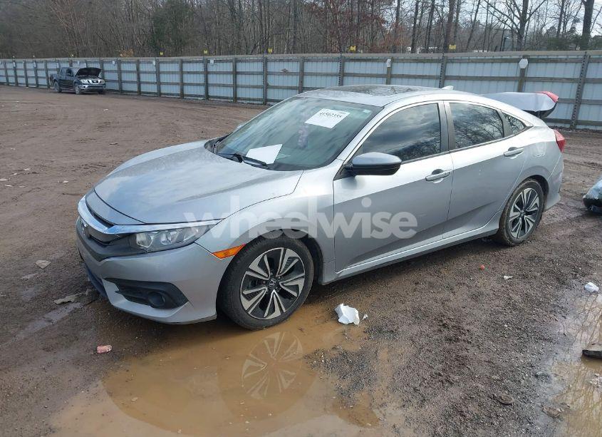 Photo 2 of 2017 Honda Civic EX-T (VIN 19XFC1F31HE006059)