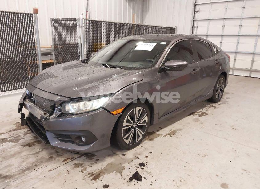 Photo 2 of 2017 Honda Civic EX-T (VIN 19XFC1F31HE006613)
