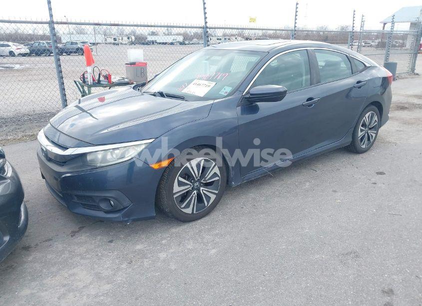 Photo 2 of 2017 Honda Civic EX-T (VIN 19XFC1F31HE010631)