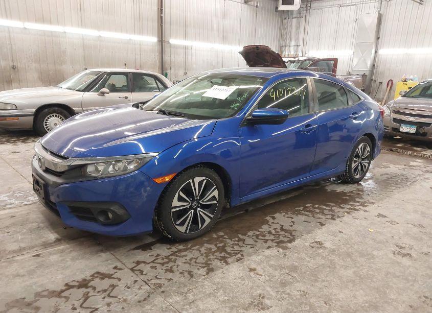 Photo 2 of 2017 Honda Civic EX-T (VIN 19XFC1F31HE013609)