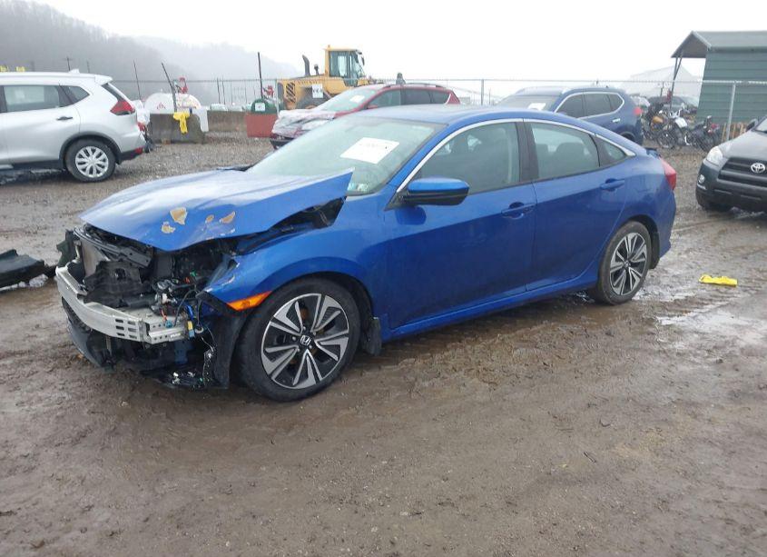 Photo 2 of 2017 Honda Civic EX-T (VIN 19XFC1F31HE200302)