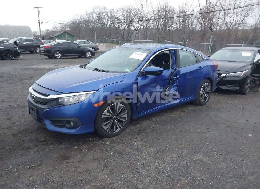 Photo 2 of 2017 Honda Civic EX-T (VIN 19XFC1F31HE202566)