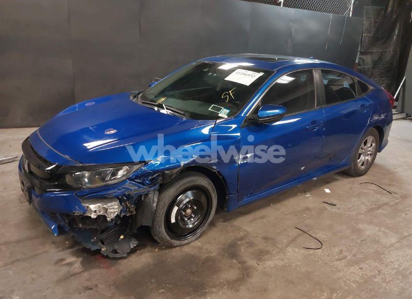 Photo 2 of 2019 Honda Civic EX (VIN 19XFC1F31KE202770)