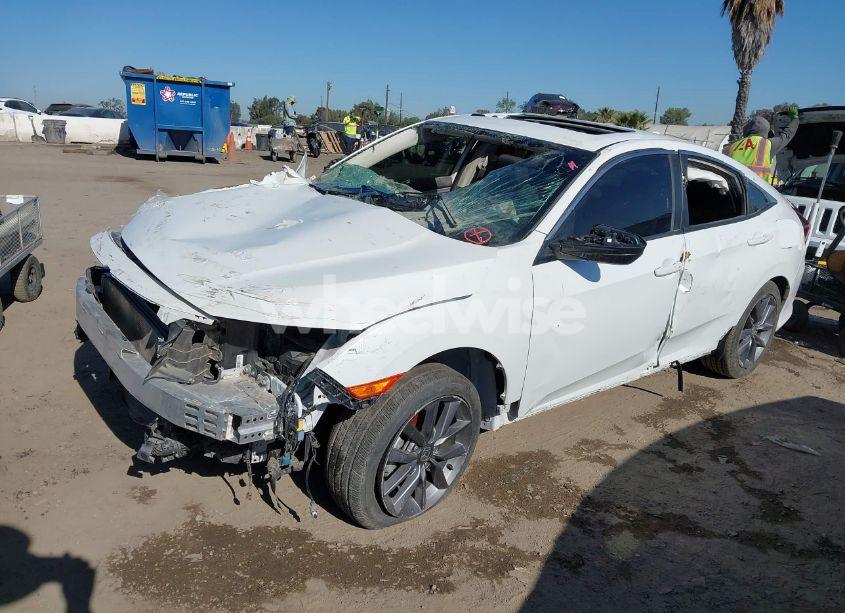 Photo 2 of 2019 Honda Civic EX (VIN 19XFC1F31KE206219)