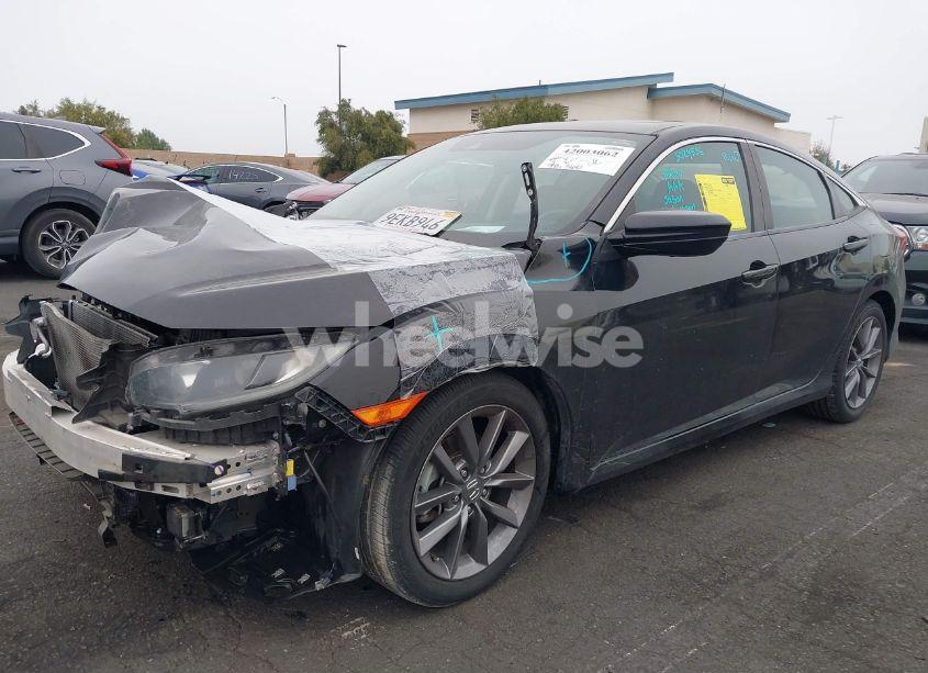 Photo 2 of 2019 Honda Civic EX (VIN 19XFC1F31KE216118)
