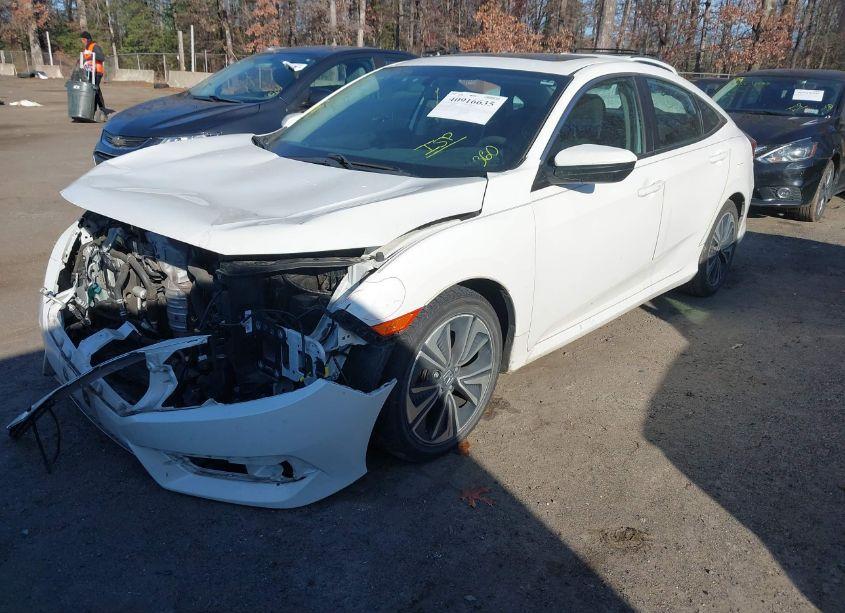 Photo 2 of 2017 Honda Civic EX-T (VIN 19XFC1F32HE211907)