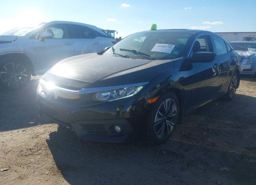 Photo 2 of 2017 Honda Civic EX-T (VIN 19XFC1F33HE012011)