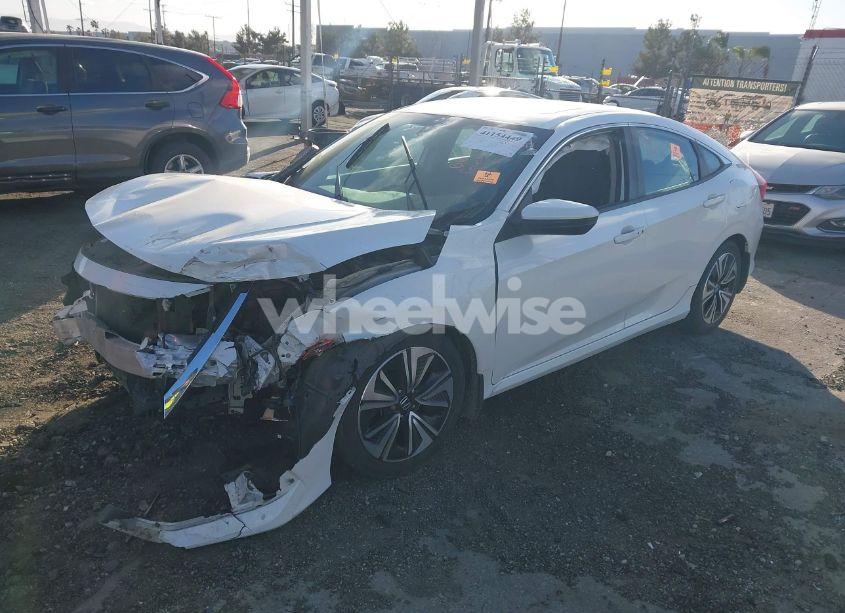 Photo 2 of 2017 Honda Civic EX-T (VIN 19XFC1F33HE203671)