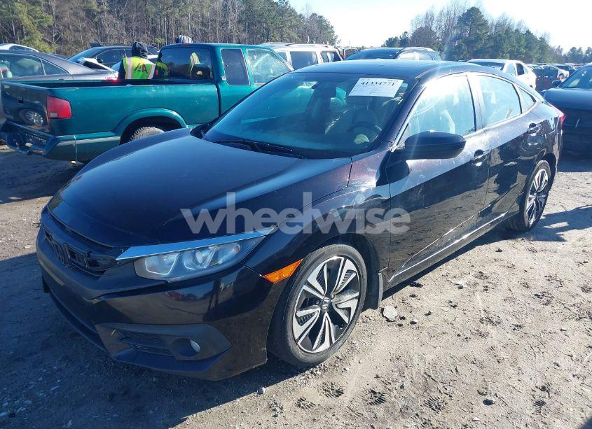 Photo 2 of 2017 Honda Civic EX-T (VIN 19XFC1F34HE010686)